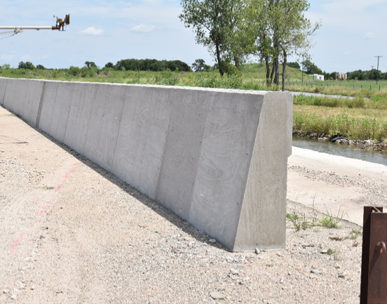 54-Inch Tall Single-Slope Concrete Barrier on a Structurally ...