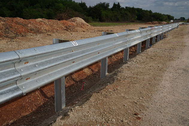 MASH Testing of a Guardrail System on 1H:1V Slope - Roadside Safety ...